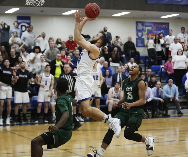 Faith before basketball for Yeshiva University champions AP News